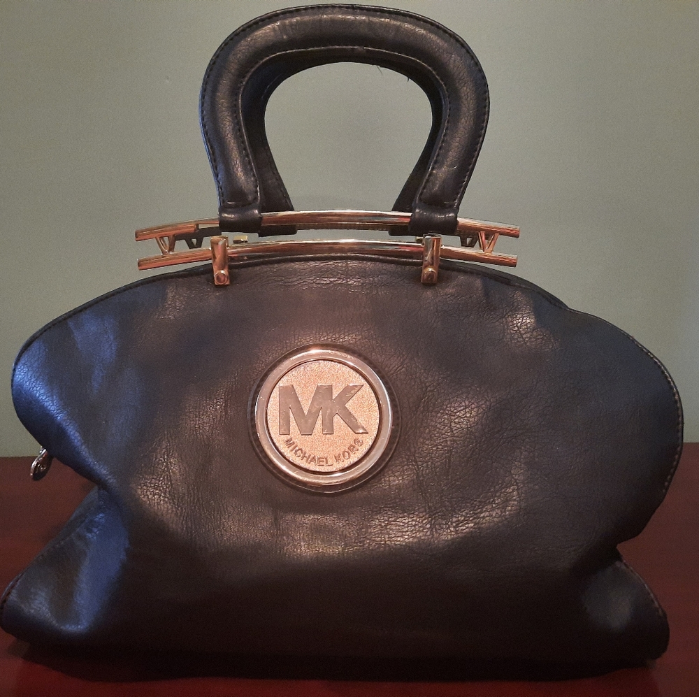 Black with gold hardware Michael Kors bag purse